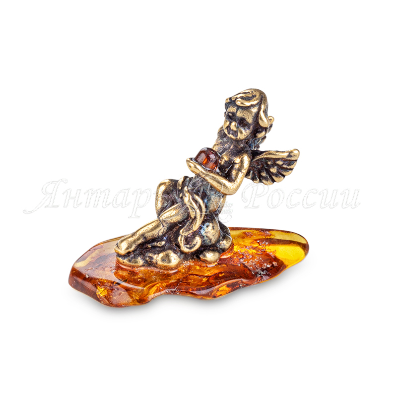 Ангел сидит полулежа Латунь, янтарь Ангел сидит полулежа Латунь, янтарь